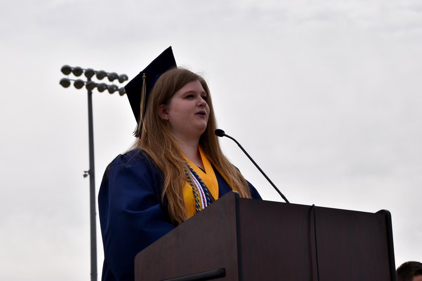 Valedictorian Nina Palmer speech, "teachers and administration, we are here because of your dedication to education who have influenced the future at least one in cap and gown today. Palmer is going to school to student zoology at Colorado State University.